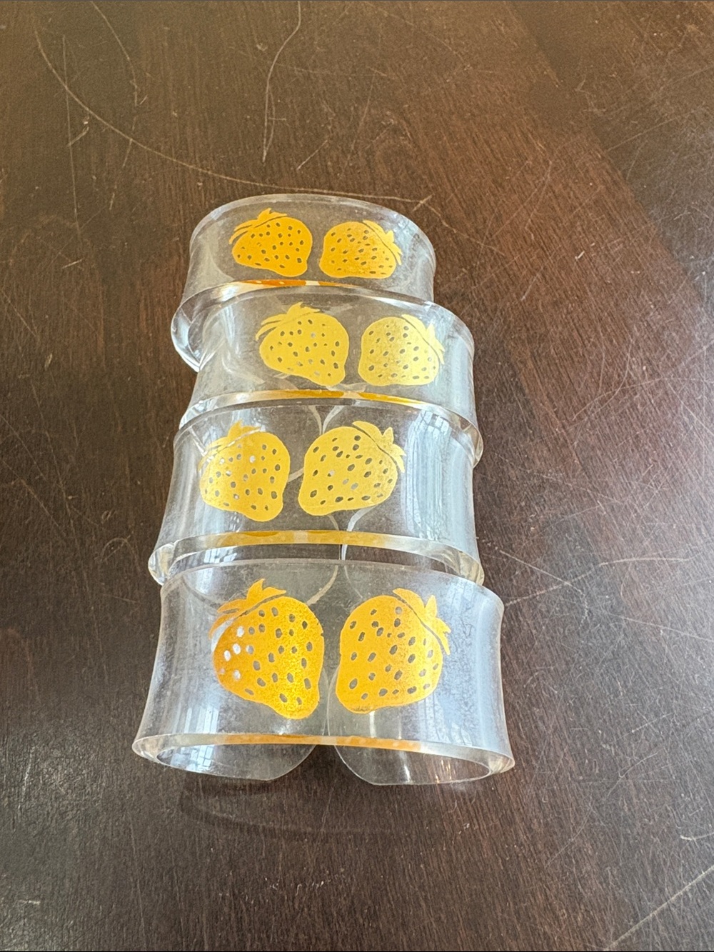 Set of 4 Clear Napkin Rings with Gold Strawberry Motif